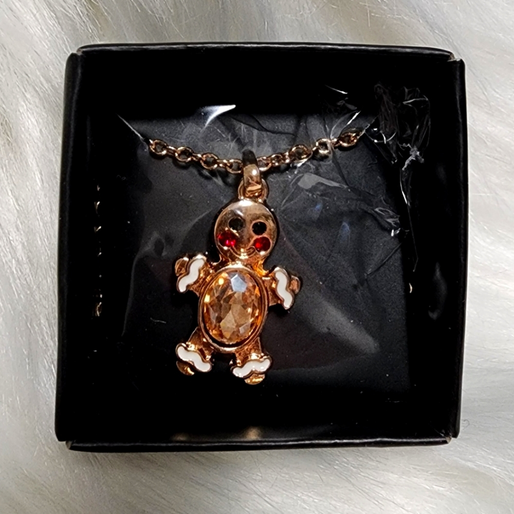 Avon- Gingerbread man necklace